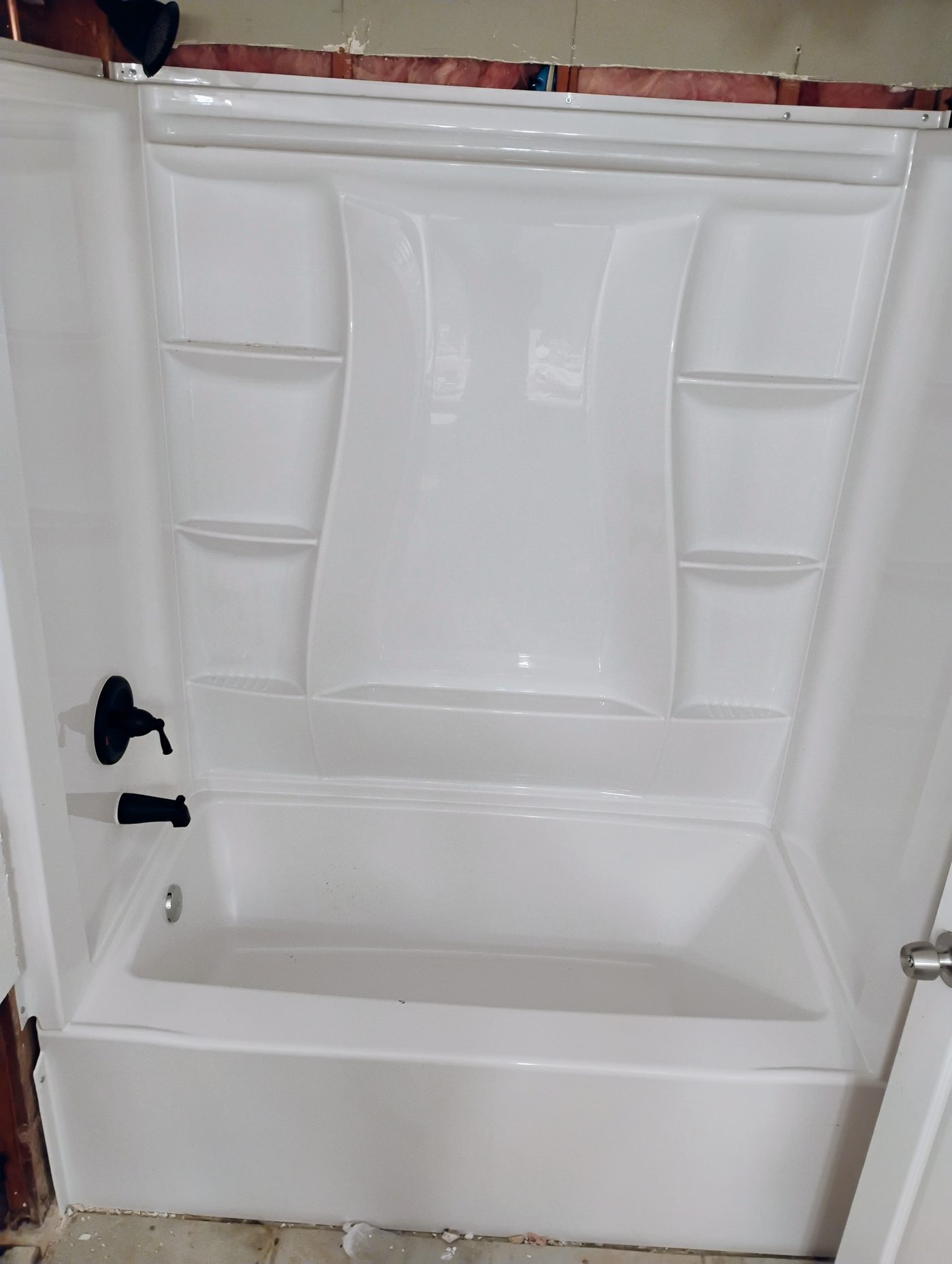 New tub and shower surround installed
