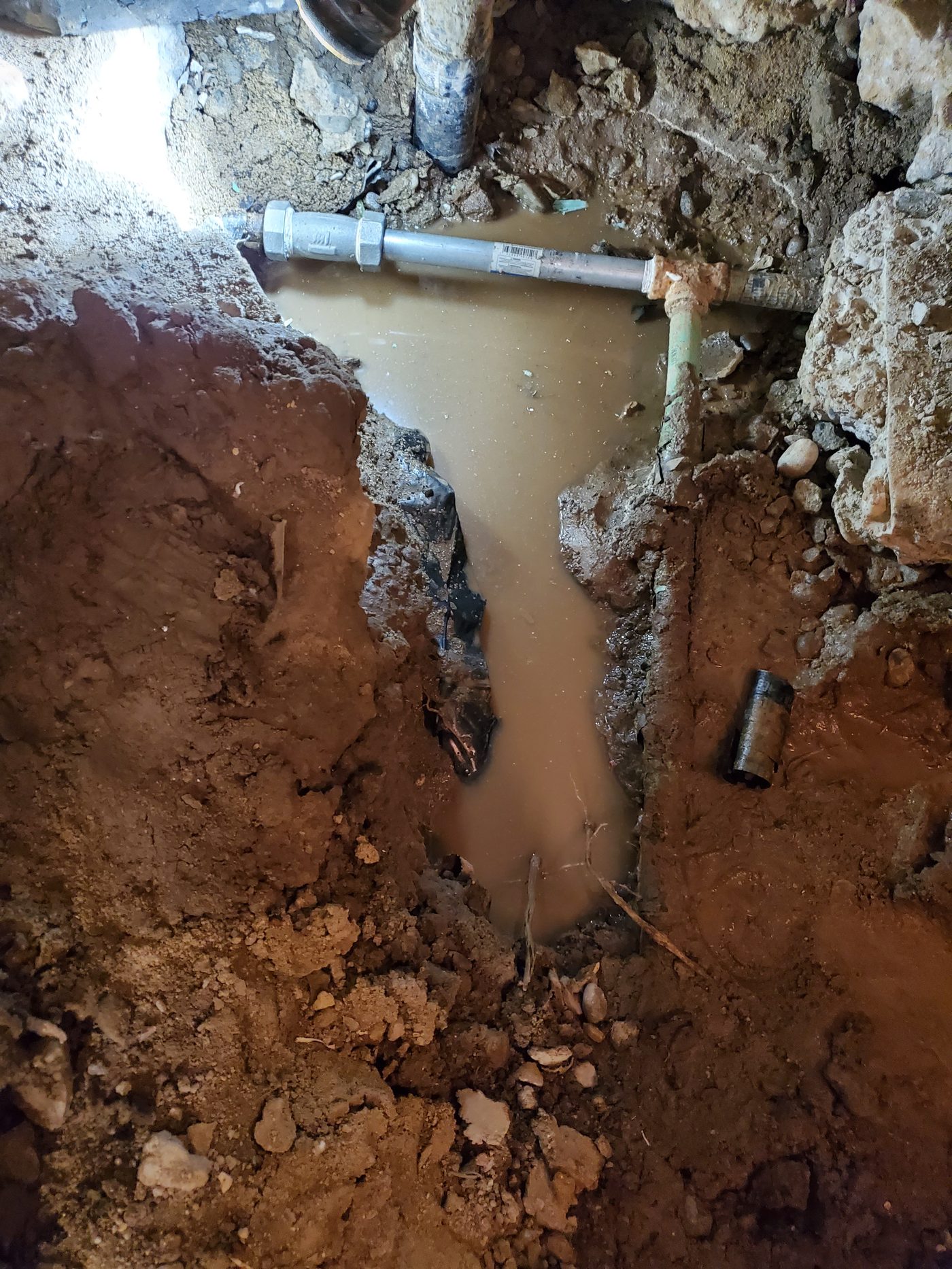 Underground water line rough-in before slab pour on a JDP Plumbing project